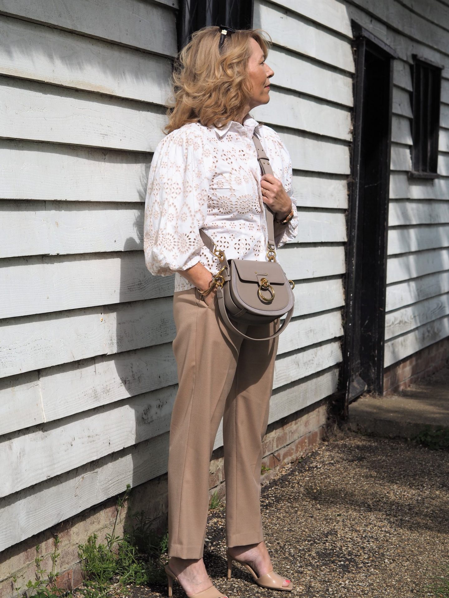 Emma Hill wears Chloe Tess bag in Motty Grey, cream winter coat